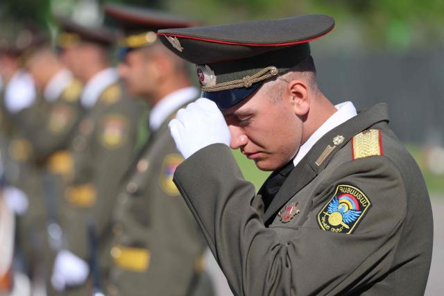Armenian honour guards wait for the arrival of French President at the Tsitsernakaberd Armenian Genocide Memorial, with Mount Ararat seen in distance, in Yerevan on May 5, 2026. (Photo by Ludovic MARIN / AFP)