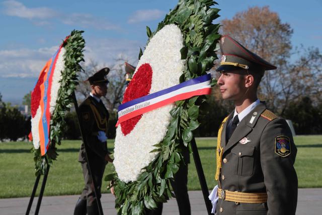 Armenian honour guards wait for the arrival of French President at the Tsitsernakaberd Armenian Genocide Memorial in Yerevan on May 5, 2026. (Photo by Ludovic MARIN / AFP)
