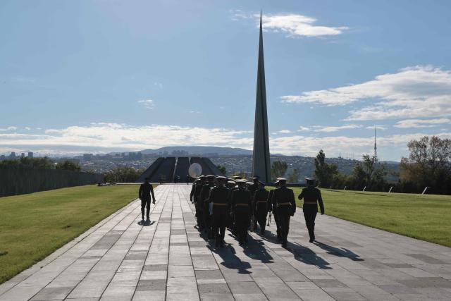 Armenian military musicians get ready for the arrival of French President at the Tsitsernakaberd Armenian Genocide Memorial in Yerevan on May 5, 2026. (Photo by Ludovic MARIN / AFP)