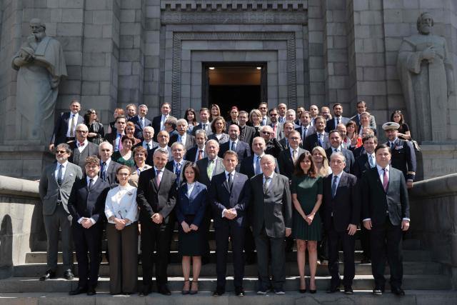 France's President Emmanuel Macron visits the Matenadaran museum, Armenia's cultural institution which houses the vast collection of ancient manuscripts, in Yerevan on May 5, 2026. (Photo by Ludovic MARIN / AFP)