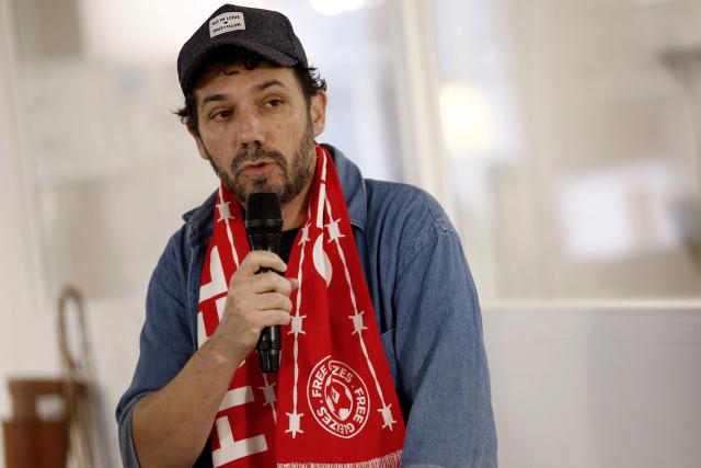 Journalist and founder of French press group So Press Franck Annese speaks during a press conference of the mother and stepfather of jailed French sports journalist Christophe Gleizes, in Paris on May 5, 2026. Gleizes was arrested in May 2024 and sentenced to seven years in prison in Algeria while travelling to northeastern Algeria's Kabylia region to write about the country's most decorated football club, Jeunesse Sportive de Kabylie. (Photo by Kenzo TRIBOUILLARD / AFP)