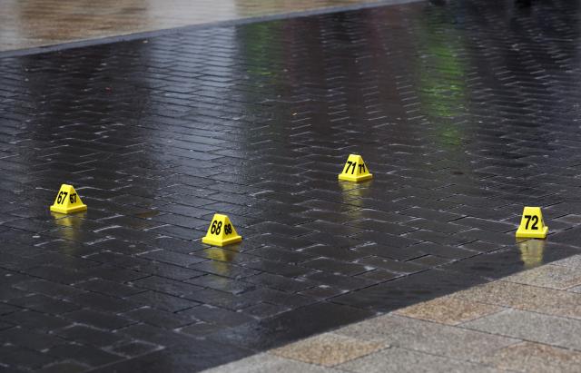 Police marks are seen in a street as investigations are under way, one day after a car ploughed into people on a street leaving at least two dead and several injured, in the city centre in Leipzig, eastern Germany, on May 5, 2026. The driver, a 33-year-old German man, was arrested on May 4 at the scene and officials said his motivation was unclear. Germany has been shaken by a series of car-ramming attacks in recent years, including one targeting a Christmas market in 2024 in Magdeburg, and also in Berlin and Munich. (Photo by Jens SCHLUETER / AFP)