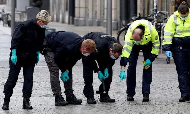 Police investigators work at the scene, one day after a car ploughed into people on a street leaving at least two dead and several injured, in the city centre in Leipzig, eastern Germany, on May 5, 2026. The driver, a 33-year-old German man, was arrested on May 4 at the scene and officials said his motivation was unclear. Germany has been shaken by a series of car-ramming attacks in recent years, including one targeting a Christmas market in 2024 in Magdeburg, and also in Berlin and Munich. (Photo by Jens SCHLUETER / AFP)