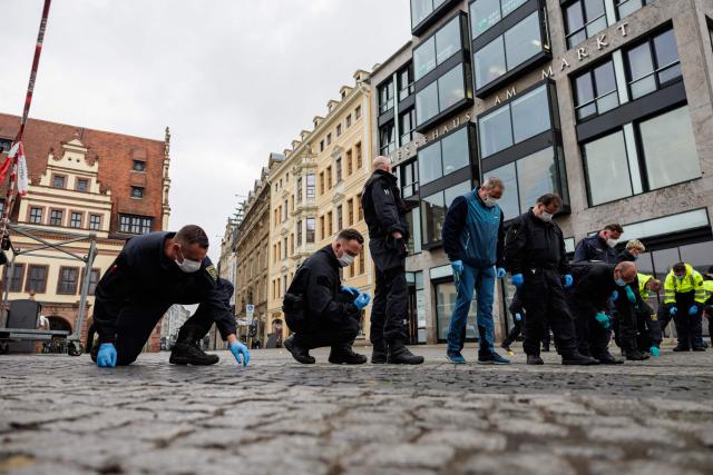 Police investigators work at the scene, one day after a car ploughed into people on a street leaving at least two dead and several injured, in the city centre in Leipzig, eastern Germany, on May 5, 2026. The driver, a 33-year-old German man, was arrested on May 4 at the scene and officials said his motivation was unclear. Germany has been shaken by a series of car-ramming attacks in recent years, including one targeting a Christmas market in 2024 in Magdeburg, and also in Berlin and Munich. (Photo by Jens SCHLÜTER / AFP)