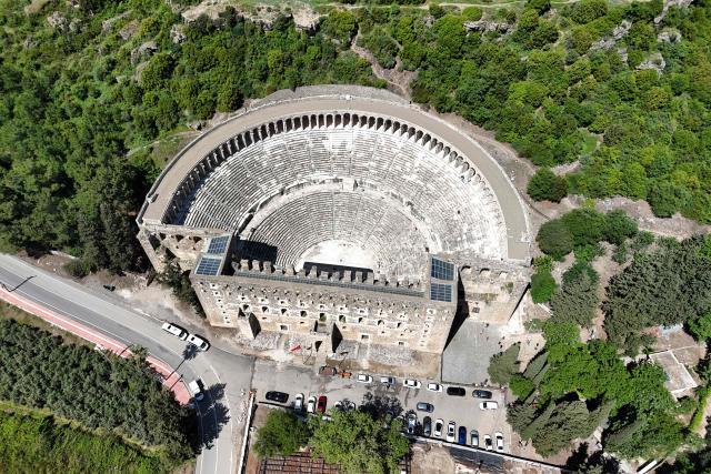 This aerial photograph shows a view of the ancient amphitheater of Aspendos, part of the ancient Greco-Roman city in Antalya province, in Antalya on May 4, 2026. (Photo by ADEM ALTAN / AFP)
