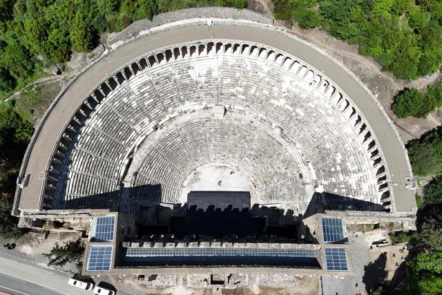This aerial photograph shows a view of the ancient amphitheater of Aspendos, part of the ancient Greco-Roman city in Antalya province, in Antalya on May 4, 2026. (Photo by ADEM ALTAN / AFP)