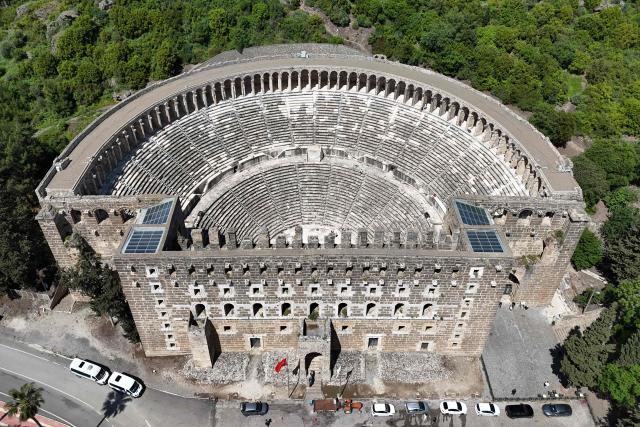 This aerial photograph shows a view of the ancient amphitheater of Aspendos, part of the ancient Greco-Roman city in Antalya province, in Antalya on May 4, 2026. (Photo by ADEM ALTAN / AFP)