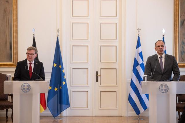 German Foreign Minister Johann Wadephul (L) speaks next to Greek Foreign Minister George Gerapetritis during a press conference at the Ministry of Foreign Affairs in Athens, on May 4, 2026. (Photo by Angelos TZORTZINIS / AFP)