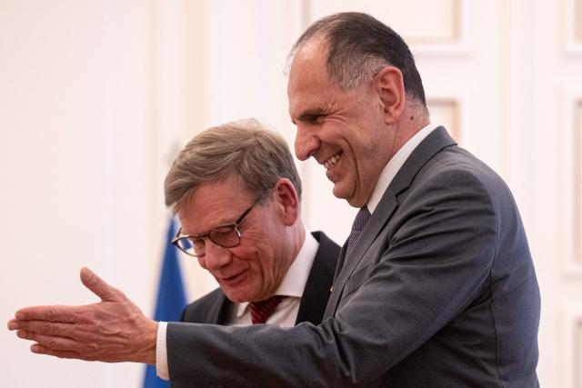 German Foreign Minister Johann Wadephul (L) leaves with Greek Foreign Minister George Gerapetritis after a press conference at the Ministry of Foreign Affairs in Athens, on May 4, 2026. (Photo by Angelos TZORTZINIS / AFP)
