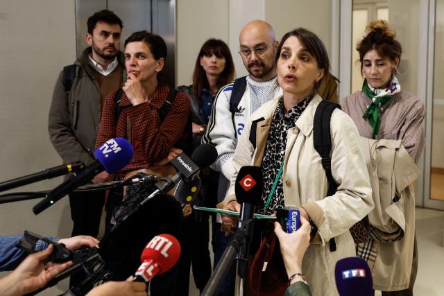 A victim's mother speaks to the press on behalf of all the families of the victims ahead of the sexual assault trial against an after-school club leader at a primary school, at the Paris courthouse on May 5, 2026. A youth worker at a Parisian school, facing charges of sexually assaulting minors, stands trial in the first case of violence in after-school programs since the scandal broke in the French capital, revealing a problem that is likely nationwide. The 47-year-old youth worker is appearing in court on charges of sexually harassing nine girls and sexually assaulting three of them, offenses that carry a potential sentence of up to ten years in prison and a fine of 150,000. (Photo by Kenzo TRIBOUILLARD / AFP)