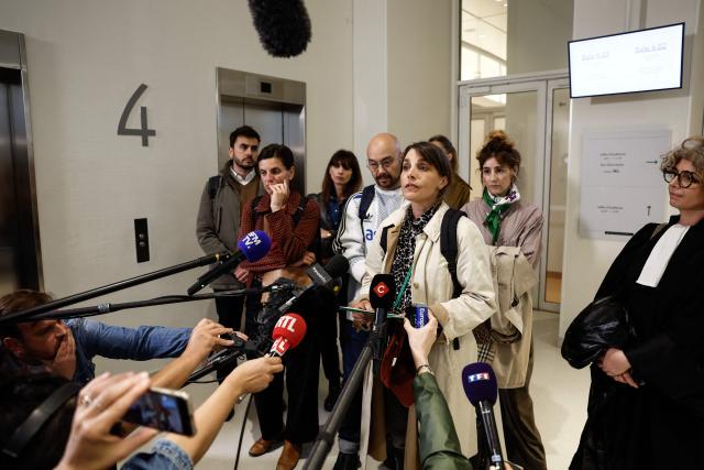 A victim's mother speaks on behalf of all the families of the victims ahead of the sexual assault trial against an after-school club leader at a primary school, at the Paris courthouse on May 5, 2026. A youth worker at a Parisian school, facing charges of sexually assaulting minors, stands trial in the first case of violence in after-school programs since the scandal broke in the French capital, revealing a problem that is likely nationwide. The 47-year-old youth worker is appearing in court on charges of sexually harassing nine girls and sexually assaulting three of them, offenses that carry a potential sentence of up to ten years in prison and a fine of 150,000. (Photo by Kenzo TRIBOUILLARD / AFP)