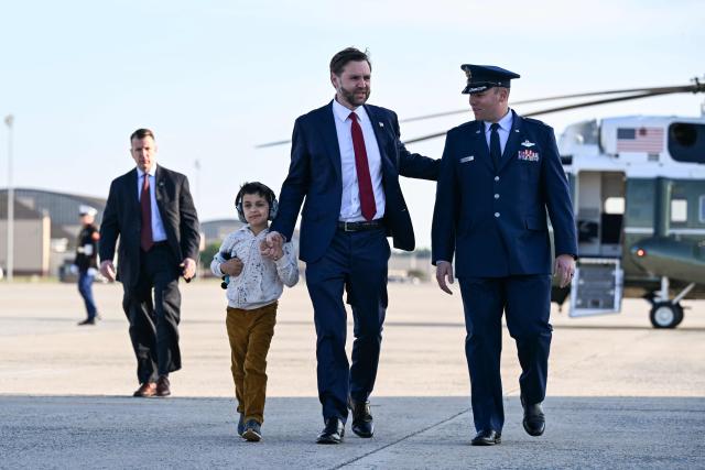 US Vice President JD Vance and his son Vivek walk to board Air Force Two at Joint Base Andrews, Maryland on May 5, 2026. Vance is traveling to Ohio, Oklahoma, and Iowa. (Photo by Roberto Schmidt / POOL / AFP)