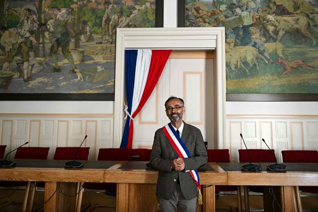 Mayor of Beziers Robert Menard poses in his office at the city hall of Beziers, southern France on May 5, 2026. (Photo by Gabriel BOUYS / AFP)