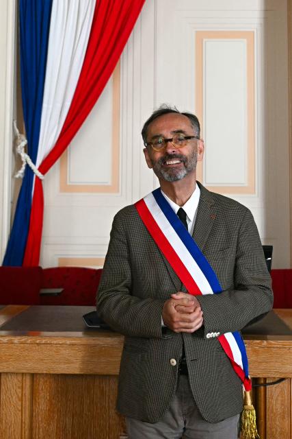 Mayor of Beziers Robert Menard poses in his office at the city hall of Beziers, southern France on May 5, 2026. (Photo by Gabriel BOUYS / AFP)