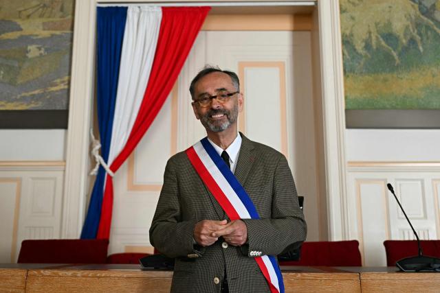 Mayor of Beziers Robert Menard poses in his office at the city hall of Beziers, southern France on May 5, 2026. (Photo by Gabriel BOUYS / AFP)