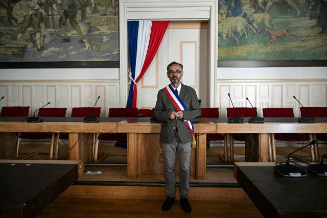 Mayor of Beziers Robert Menard poses in his office at the city hall of Beziers, southern France on May 5, 2026. (Photo by Gabriel BOUYS / AFP)