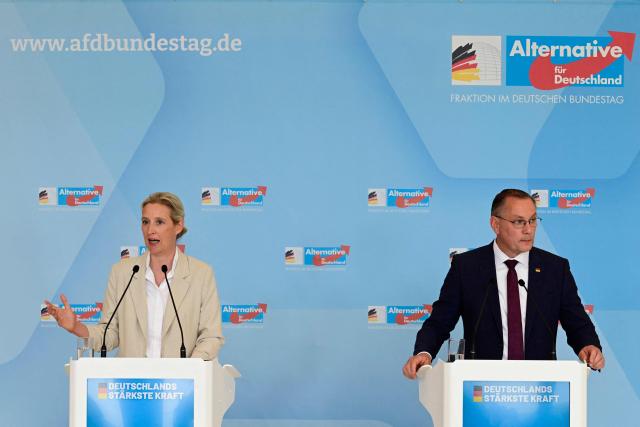The co-leaders of Germany's far-right Alternative for Germany (AfD) party Alice Weidel (L) and Tino Chrupalla address a press conference on May 5, 2026 in Berlin, following a meeting of their party's parliamentary group. (Photo by John MACDOUGALL / AFP)