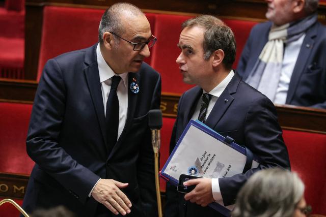 France's Interior Minister Laurent Nunez (L) speaks with France's Prime Minister Sebastien Lecornu dring a session of questions to the government at the National Assembly, French Parliament's lower house, in Paris on May 5, 2026. (Photo by Thomas SAMSON / AFP)