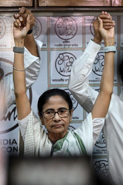 Chief Minister of West Bengal and Chairperson of All India Trinamool Congress Mamata Banerjee gestures during a press conference at her residence office in Kolkata on May 5, 2026 after her party lost the recently concluded state legislative assembly elections. Indian Prime Minister Narendra Modi's Bharatiya Janata Party (BJP) swept polls in the key eastern state of more than 100 million people, winning 206 of the 294 assembly seats, according to results announced April 4, for its first-ever victory in West Bengal. (Photo by Dibyangshu SARKAR / AFP)