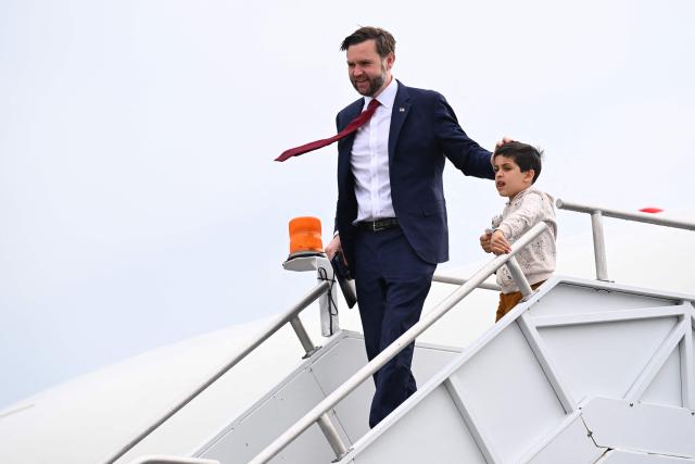 US Vice President JD Vance and his son Vivek exit Air Force Two upon arrival at Cincinnati/Northern Kentucky International Airport in Hebron, Kentucky on May 5, 2026. Vance is stopping in Ohio to vote in the state's primary election before continuing on to Oklahoma and Iowa. (Photo by Roberto Schmidt / POOL / AFP)