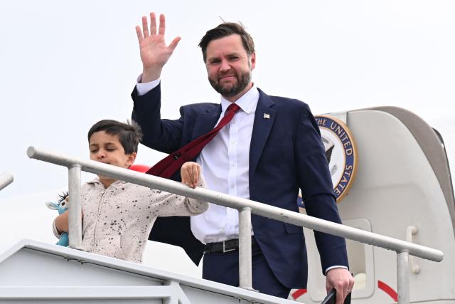 US Vice President JD Vance and his son Vivek exit Air Force Two upon arrival at Cincinnati/Northern Kentucky International Airport in Hebron, Kentucky on May 5, 2026. Vance is stopping in Ohio to vote in the state's primary election before continuing on to Oklahoma and Iowa. (Photo by Roberto Schmidt / POOL / AFP)