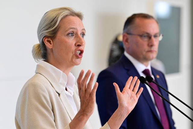 The co-leaders of Germany's far-right Alternative for Germany (AfD) party Alice Weidel (L) and Tino Chrupalla address a press conference on May 5, 2026 in Berlin, following a meeting of their party's parliamentary group. (Photo by John MACDOUGALL / AFP)