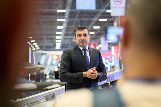 Turkey's defence company Baykar's CTO Selcuk Bayraktar talks to journalists to present new drones during the opening day of the SAHA EXPO 2024, an International Defence and Aerospace exhibition, in Istanbul on May 5, 2026. (Photo by Yasin AKGUL / AFP)