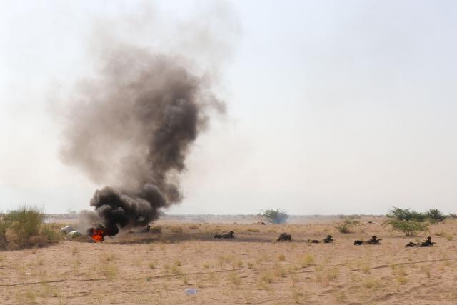 Forces affiliated with the legitimate government take part in a military exercise on the coasts of Al-Khokha area in Yemen's Hodeidah governorate on May 5, 2026. (Photo by Khaled ZIAD / AFP)