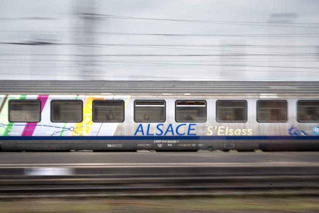 This photograph shows a Regional Express Train of the Alsace region network locomoting through the city of Strasbourg, eastern France on May 5, 2026. (Photo by SEBASTIEN BOZON / AFP)