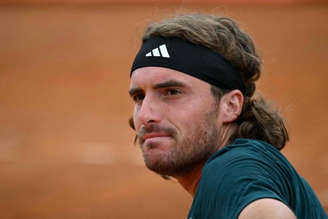 Greece's Stefanos Tsitsipas attends an exhibition match on a temporary clay tennis court at Piazza del Popolo in Rome, on the sidelines of the ATP Italian Open, on 5 May 2026. (Photo by Andreas SOLARO / AFP)