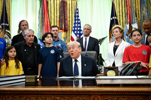 US President Donald Trump speaks before signing a proclamation to revive the Presidential Fitness Test Award, a competitive school-based fitness program, in the Oval Office of the White House in Washington, DC on May 5, 2026. (Photo by Kent NISHIMURA / AFP)