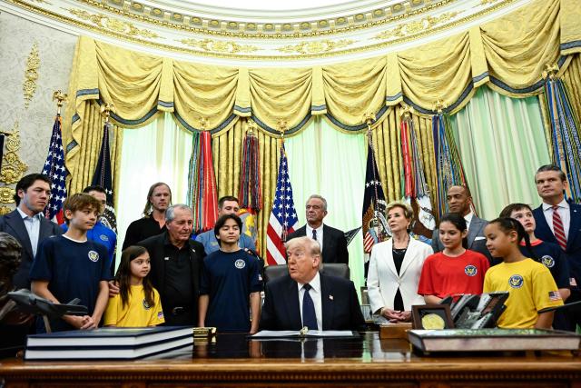 US President Donald Trump speaks before signing a proclamation to revive the Presidential Fitness Test Award, a competitive school-based fitness program, in the Oval Office of the White House in Washington, DC on May 5, 2026. (Photo by Kent NISHIMURA / AFP)