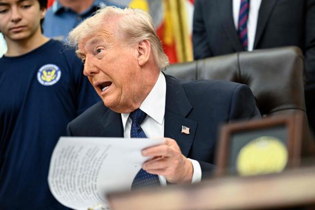 US President Donald Trump speaks before signing a proclamation to revive the Presidential Fitness Test Award, a competitive school-based fitness program, in the Oval Office of the White House in Washington, DC on May 5, 2026. (Photo by Kent NISHIMURA / AFP)