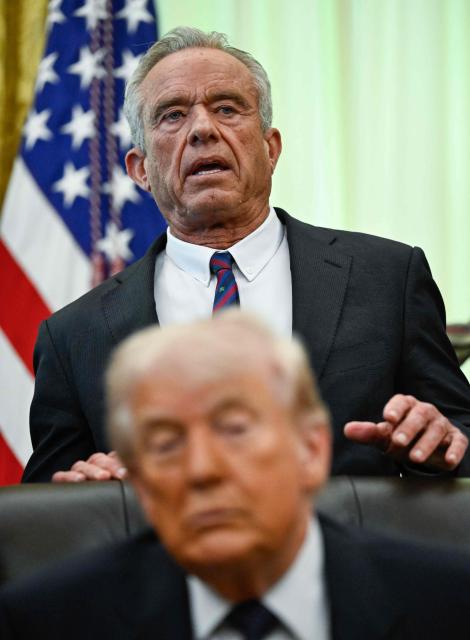US Secretary of Health and Human Services Robert F. Kennedy Jr. speaks before President Donald Trump signs a proclamation to revive the Presidential Fitness Test Award, a competitive school-based fitness program, in the Oval Office of the White House in Washington, DC on May 5, 2026. (Photo by Kent NISHIMURA / AFP)