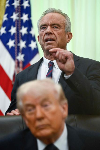 US Secretary of Health and Human Services Robert F. Kennedy Jr. speaks before President Donald Trump signs a proclamation to revive the Presidential Fitness Test Award, a competitive school-based fitness program, in the Oval Office of the White House in Washington, DC on May 5, 2026. (Photo by Kent NISHIMURA / AFP)