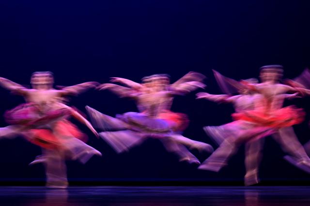 Members of the Les Ballets Trockadero de Monte Carlo, known as 'The Trocks', perform during a dress run for the start of their 50th anniversary UK tour, at the Sadler’s Wells Theatre in central London on May 5, 2026. (Photo by JUSTIN TALLIS / AFP)