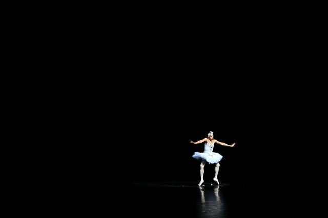 A member of the Les Ballets Trockadero de Monte Carlo, known as 'The Trocks', performs during a dress run for the start of their 50th anniversary UK tour, at the Sadler’s Wells Theatre in central London on May 5, 2026. (Photo by JUSTIN TALLIS / AFP)