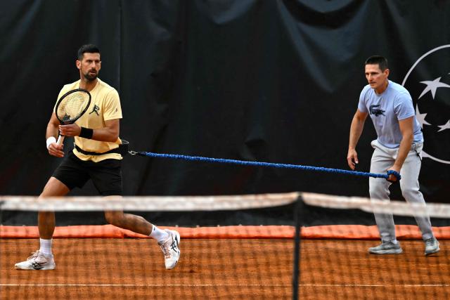 Serbia's Novak Djokovic attends an exhibition training on a temporary clay tennis court at Piazza del Popolo in Rome, on the sidelines of the ATP Italian Open, on 5 May 2026. (Photo by Andreas SOLARO / AFP)