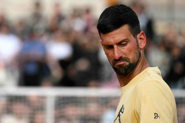 Serbia's Novak Djokovic attends an exhibition match on a temporary clay tennis court at Piazza del Popolo in Rome, on the sidelines of the ATP Italian Open, on 5 May 2026. (Photo by Andreas SOLARO / AFP)