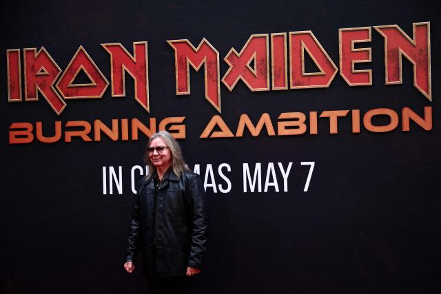 Dave Murray of Iron Maiden poses on the red carpet upon arrival to attend the world premiere of 'Iron Maiden: Burning Ambition' at Cineworld Leicester Square, in central London on May 5, 2026. (Photo by Henry NICHOLLS / AFP)