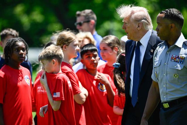 US President Donald Trump arrives to watch young student athletes participate in exercise activities on the South Lawn of the White House after President Trump signed a proclamation to revive the Presidential Fitness Test Award, a competitive school-based fitness program, in Washington, DC on May 5, 2026. (Photo by Kent NISHIMURA / AFP)