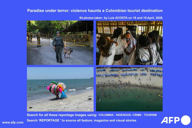 AFP presents a visual story of 84 photographs by Luis Acosta, taken on April 18 and 19, 2026, on the violence affecting the paradisiacal Sierra Nevada de Santa Marta, Colombia. At first glance, it appears to be a postcard-perfect tourist jewel, with crystal-clear Caribbean waters and mountains crowned by snowcapped peaks. But beneath the surface of Colombias idyllic destination, paramilitary violence keeps shopkeepers and Indigenous communities living in fear. In the Sierra Nevada de Santa Marta, tourists roam unaware of camouflaged squads monitoring them from close range, extorting nearby businesses and spreading terror among Indigenous communities, whose ancestral knowledge has been recognized by UNESCO as part of the worlds cultural heritage.

Search for all these reportage images using: COLOMBIA-INDIGENOUS-CRIME-TOURISM
Search "REPORTAGE" to source all feature, magazine and visual story. (Photo by Luis ACOSTA / AFP)