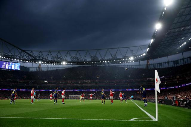 Atletico Madrid's Spanish defender #18 Marc Pubill takes a throw in during the UEFA Champions League second-leg semi-final football match between Arsenal and Atletico Madrid at the Emirates Stadium in north London on May 5, 2026. (Photo by Adrian DENNIS / AFP)