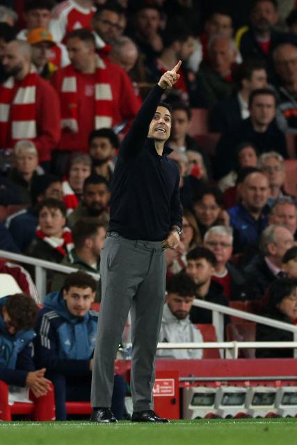 Arsenal's Spanish manager Mikel Arteta shouts instructions to the players from the touchline during the UEFA Champions League second-leg semi-final football match between Arsenal and Atletico Madrid at the Emirates Stadium in north London on May 5, 2026. (Photo by Adrian Dennis / AFP)