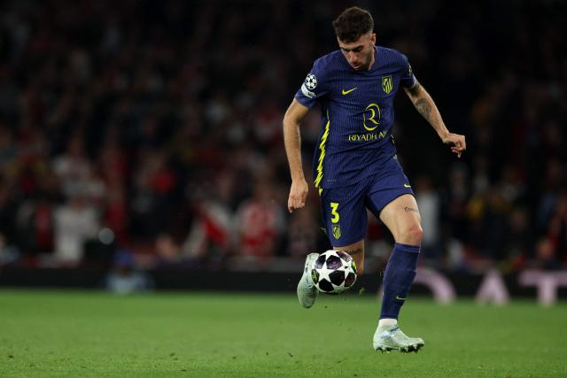 Atletico Madrid's Italian defender #03 Matteo Ruggeri runs with the ball during the UEFA Champions League second-leg semi-final football match between Arsenal and Atletico Madrid at the Emirates Stadium in north London on May 5, 2026. (Photo by Adrian Dennis / AFP)