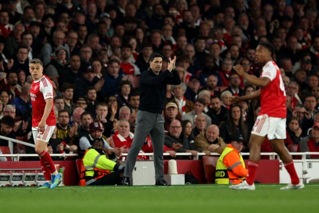 Arsenal's Spanish manager Mikel Arteta applauds during the UEFA Champions League second-leg semi-final football match between Arsenal and Atletico Madrid at the Emirates Stadium in north London on May 5, 2026. (Photo by Adrian Dennis / AFP)
