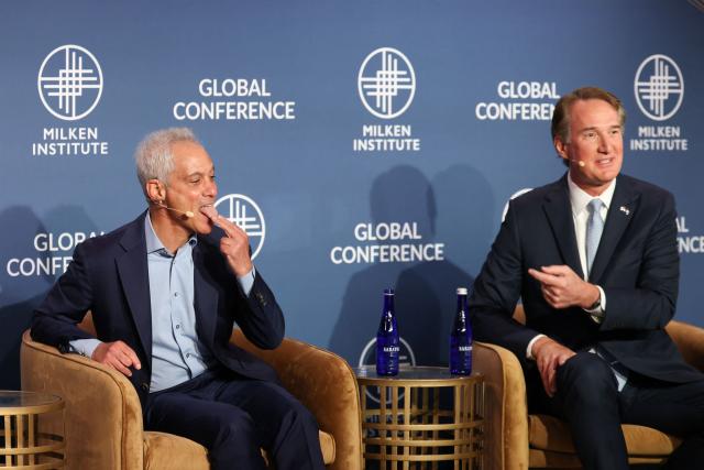 Former Governor of Virginia Glenn Youngkin (R) and former Mayor of Chicago Rahm Emanuel  speak during the 29th annual Milken Institute Global Conference at the Beverly Hilton in Beverly Hills, California on May 5, 2026. (Photo by Patrick T. Fallon / AFP)