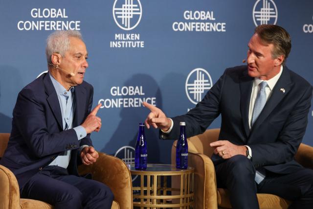 Former Governor of Virginia Glenn Youngkin (R) and former Mayor of Chicago Rahm Emanuel  speak during the 29th annual Milken Institute Global Conference at the Beverly Hilton in Beverly Hills, California on May 5, 2026. (Photo by Patrick T. Fallon / AFP)