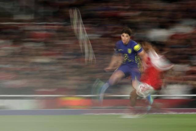 Atletico Madrid's Argentinian striker #19 Julian Alvarez crosses the ball during the UEFA Champions League second-leg semi-final football match between Arsenal and Atletico Madrid at the Emirates Stadium in north London on May 5, 2026. (Photo by Adrian Dennis / AFP)