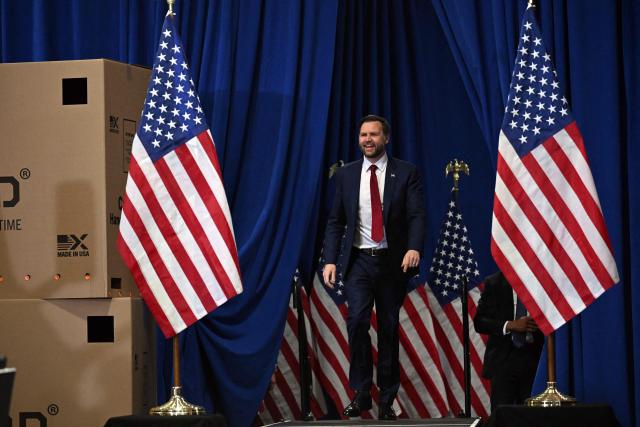 US Vice President JD Vance takes the stage during an event in support of US Representative Zach Nunn, Republican from Iowa, at Ex-Guard Industries, a manufacturing facility in Des Moines, Iowa, on May 5, 2026. JD Vance is in Iowa to support Nunn ahead of the state's June 2 primary election. (Photo by Roberto Schmidt / POOL / AFP)